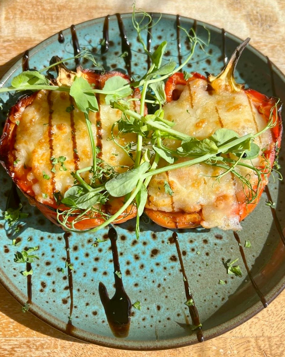 Roasted red peppers stuffed with three cheeses and beans, balsamic drizzle, at The Bank at Bude